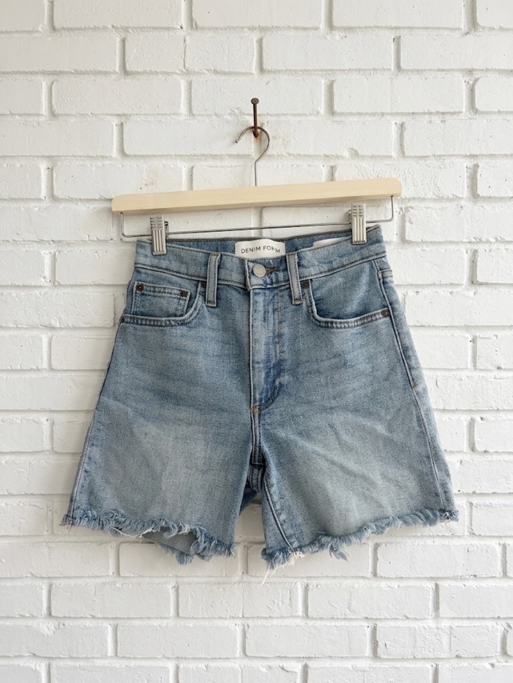 Aritzia Denim Forum The Romy Slim Mid Thigh Denim Shorts 24